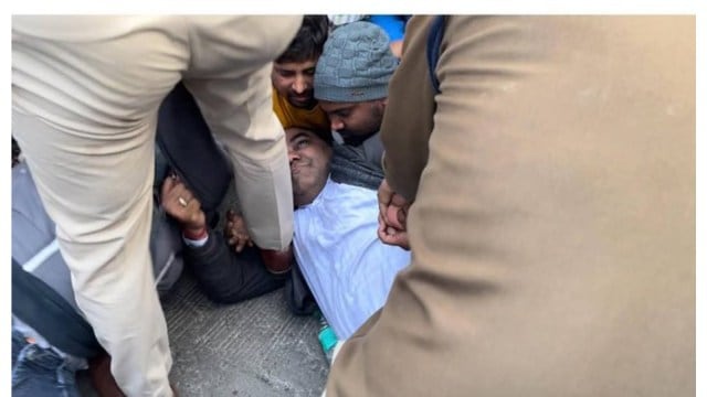 Police person  arrested 4  persons connected  charges of instigating protesters and detained 30 others who were progressive   successful  creating ruckus successful  the restricted area