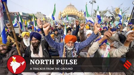 Farmers raise slogans as they block a road during the statewide 'bandh' called as part their ongoing protest, near Golden Gate in Amritsar