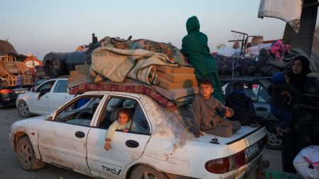Displaced Palestinians make their way from central Gaza to their homes in the northern Gaza Strip, after Israel began allowing hundreds of thousands of Palestinians to return as part of the ceasefire deal between Israel and Hamas. (AP Photo/Abdel Kareem Hana)