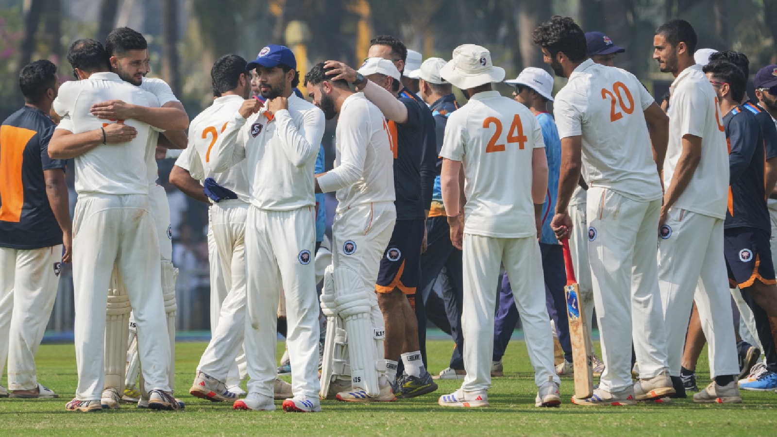 Jammu and Kashmir’s players celebrate after winning a Ranji Trophy cricket match against Mumbai at the Sharad Pawar Cricket Academy BKC in Mumbai on  Saturday. (PTI Photo)