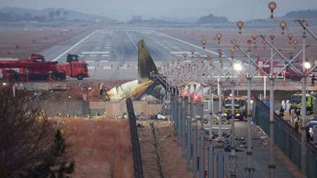 Video showed the aircraft without its landing gear deployed landing on its belly at high speed and then skidding off the end of the runaway into a concrete fence and bursting into flames. (REUTERS/Kim Hong-Ji)