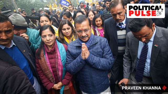 AAP National Convener Arvind Kejriwal walks with family members on way to filing his nomination for Delhi elections, in New Delhi on Wednesday. (Express Photo by Praveen Khanna)