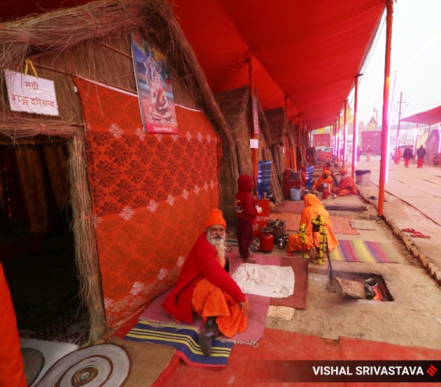 Sadhus rest at the Maha Kumbh braving the cold ahead of the Maha Kumbh mela later this month. (Express Photo by Vishal Srivastava.)