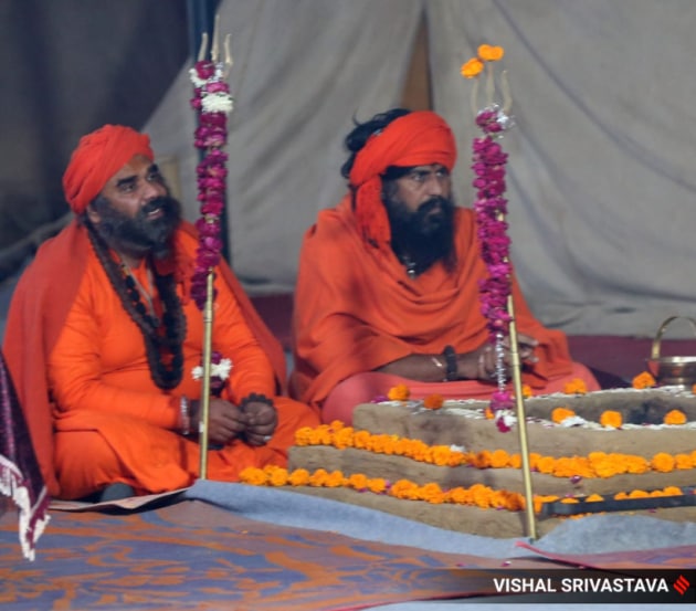 Sadhus in prayer and preparations ahead of the January 2025 Maha Kumbh mela. (Express Photo by Vishal Srivastava)