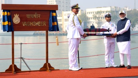 PM narendra modi, naval combatants INS Surat, INS Nilgiri and INS Vaghsheer, Naval Dockyard, PM modi in Mumbai, indian express