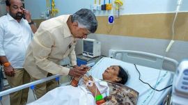 Andhra Pradesh Chief Minister N Chandrababu Naidu meets a person injured in the stampede on Wednesday, at SVIMS hospital in Tirupati, Andhra Pradesh.