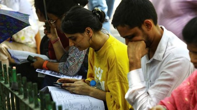 NEET UG 2025: Aspirants checking NEET exam pattern