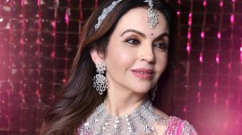 Nita Ambani adds a ₹12 crore Rolls-Royce Phantom VIII to her collection. Discover its bespoke design, stunning pink hues, powerful V12 engine, and unmatched luxury.