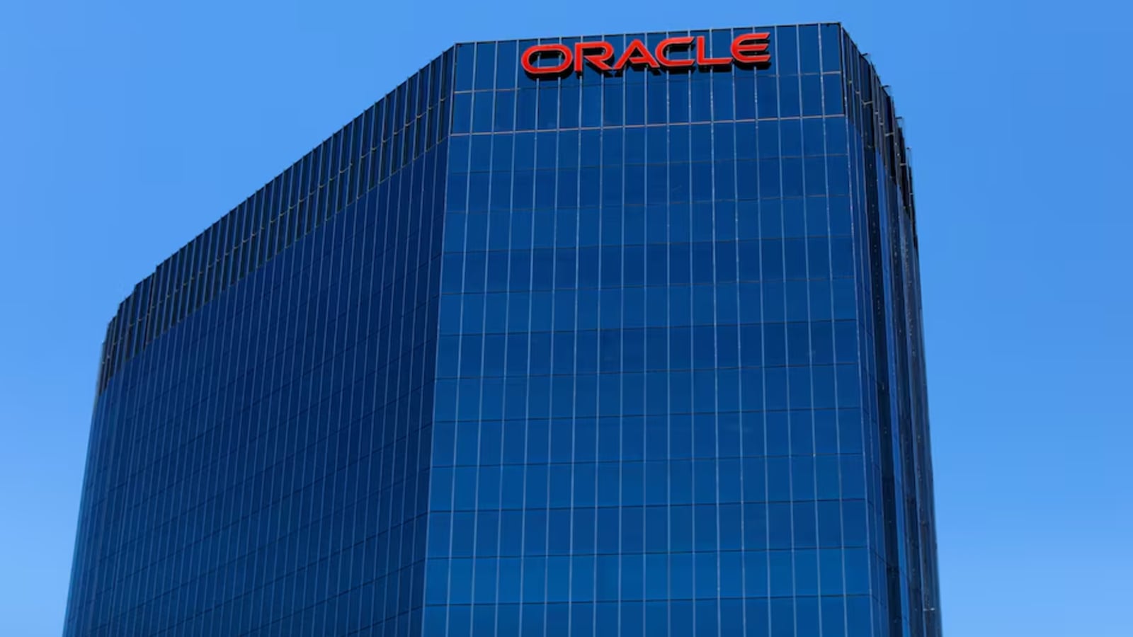 The Oracle logo is shown on an office.