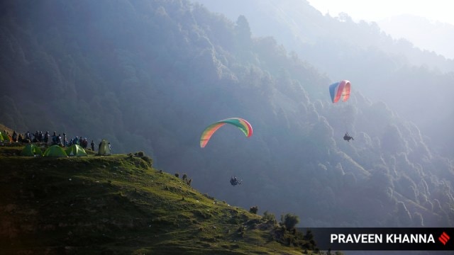 paragliding suspended goa