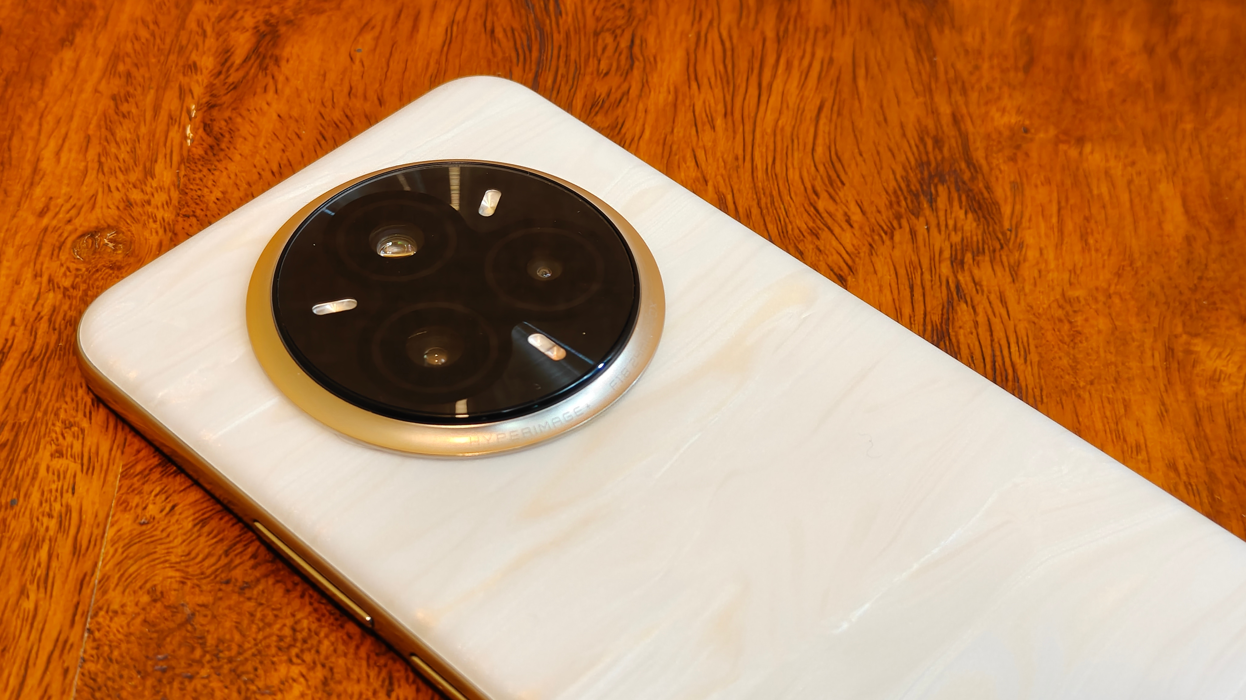 You get three cameras and three flash on the back.