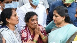Home Minister Anitha consoles the family members of those who died in the stampede on Wednesday, in Tirupati, Andhra Pradesh