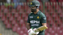 Pakistan's Fakhar Zaman reacts as he walks off the field after his dismissal during the tri-series ODI cricket final match between Pakistan and New Zealand, in Karachi, Pakistan, Friday, Feb. 14, 2025. (AP Photo)