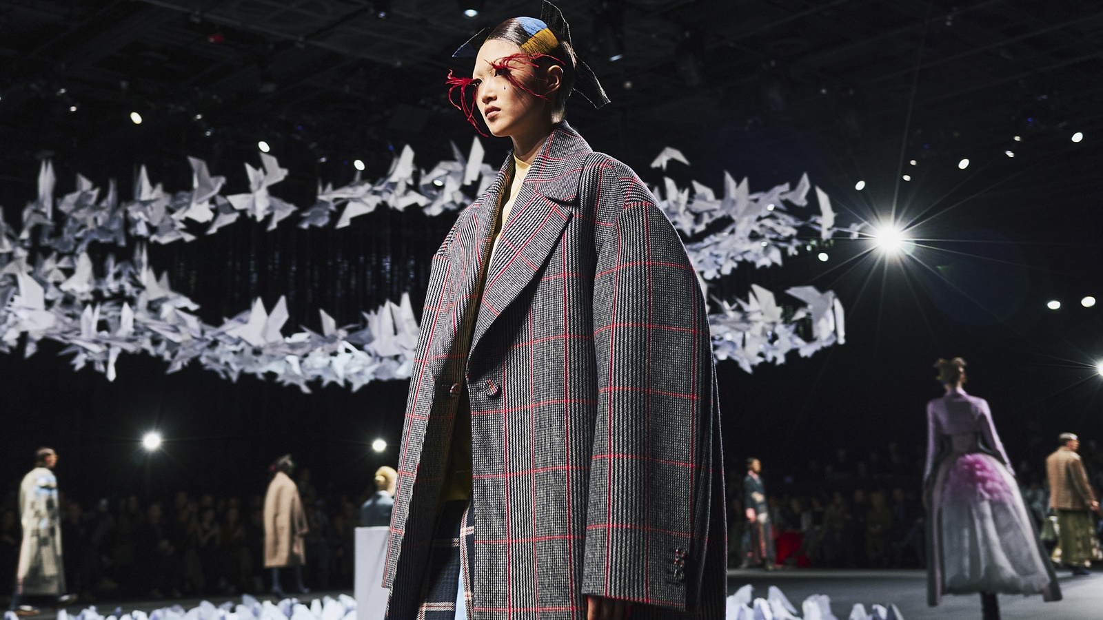 It’s a man’s world. So how should a woman dress in it?