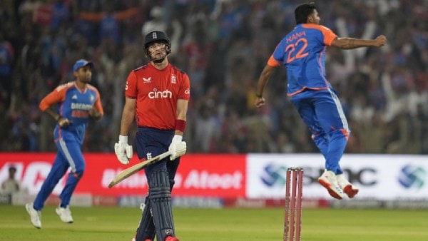 IND vs ENG: England's Liam Livingstone, center, reacts after losing his wicket to India's Harshit Rana, right, during the fourth T20 cricket match between England and India in Pune, India, Friday, Jan. 31, 2025. (AP Photo)