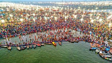 Rush of devotees at the Triveni Sangam on the eve of Magh Purnima in Prayagraj on Tuesday evening. Here's all you need to know about Magha Purnima 2025. (PTI Photo)