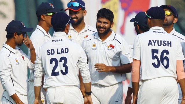 Members of the Mumbai Ranji Trophy squad  observe  a wicket. (Express Photo by Amit Chakravarty)