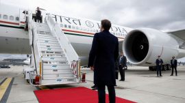 French President Emmanuel Macron looks on as Indian Prime Minister Narendra Modi boards a plane after a departure ceremony at Marseille Provence airport in Marignane as part of a visit in Marseille, France, Wednesday, Feb. 12, 2025. (Christian Hartmann/ Pool Photo via AP)