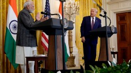 President Donald Trump speaks alongside Prime Minister Narendra Modi during a news conference in the East Room of the White House on Thursday