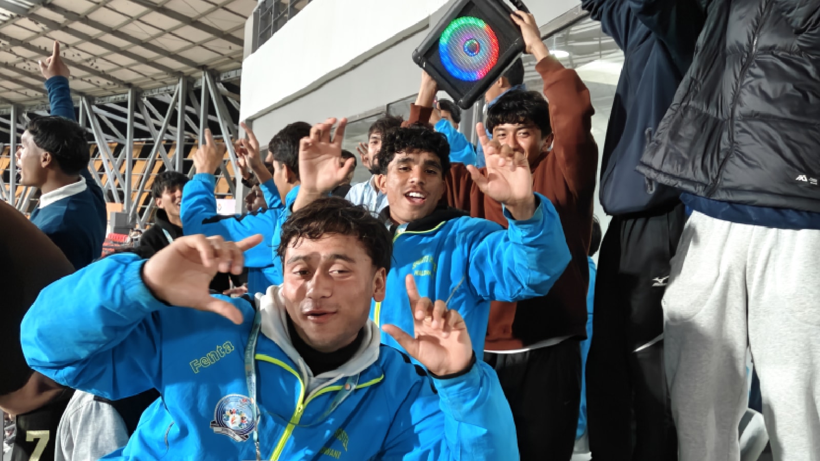 A group of boys from the football academy in Haldwani during the women's match between Uttarakhand and West Bengal. (Express Photo)