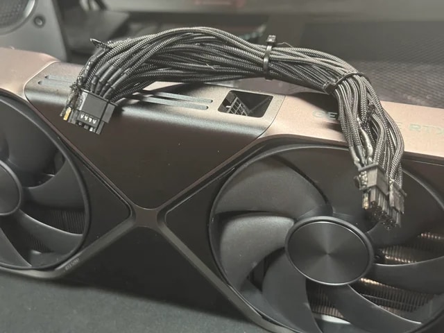 Here is an image showing the RTX 5090 with a burnt power connector.