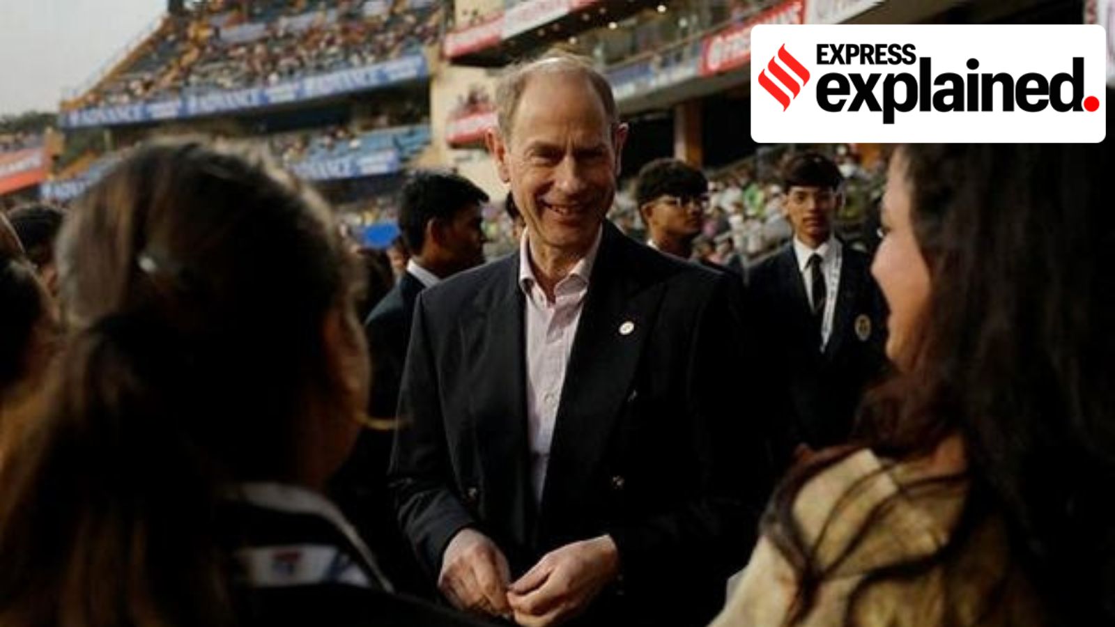 Britain's Prince Edward, Duke of Edinburgh speaks with students before the India-England T20I match
