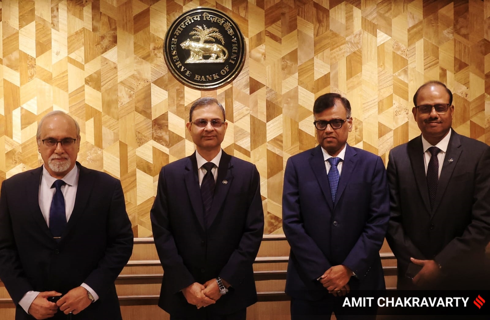 RBI Governor Sanjay Malhotra with members of the Monetary Policy Committee.