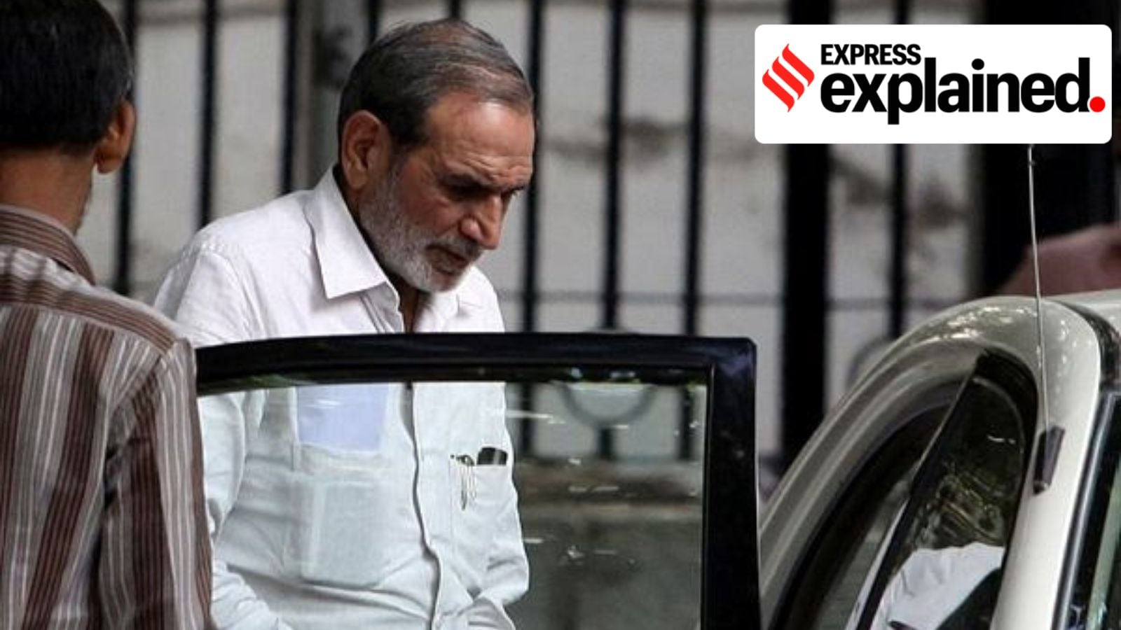 Congress leader Sajjan Kumar leaves after appearing in the Karkardooma court in connection with the 1984 Sikhs riots' case, in New Delhi in a 2011 hearing