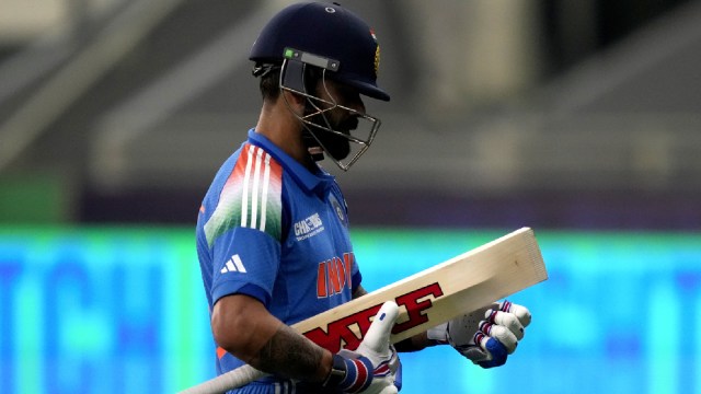 India's Virat Kohli walks off the field after losing his wicket during the ICC Champions Trophy cricket match between India and Bangladesh at Dubai International Cricket Stadium in Dubai, United Arab Emirates, Thursday, Feb. 20, 2025. (AP Photo)