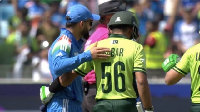 IND vs PAK: India's Virat Kohli greets Pakistan's Babar Azam before the start of play in their ICC Champions Trophy clash. (Screenshot: JioHotstar)