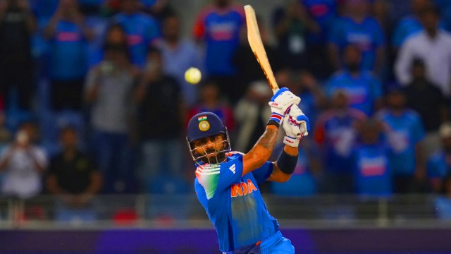 India's Virat Kohli hits winning runs during the ICC Champions Trophy cricket match between India and Pakistan at Dubai International Cricket Stadium, United Arab Emirates, Sunday, Feb. 23, 2025. (AP Photo)