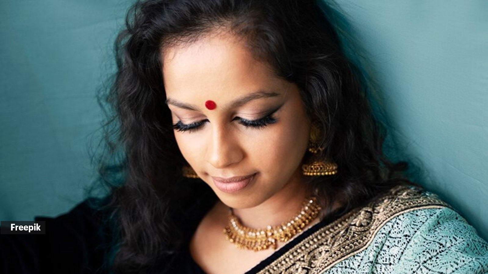 Historically, the traditional bindi was created using vermillion powder
