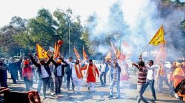 BJP workers celebrate election results at Delhi BJP office, in New Delhi on Saturday.