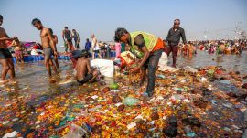 Puja material and other waste being collected at the Sangam for their disposal, during the ongoing Maha Kumbh Mela 2025, in Prayagraj,