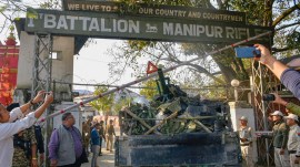 Arambai Tenggol hands over arms and ammunition to security officials