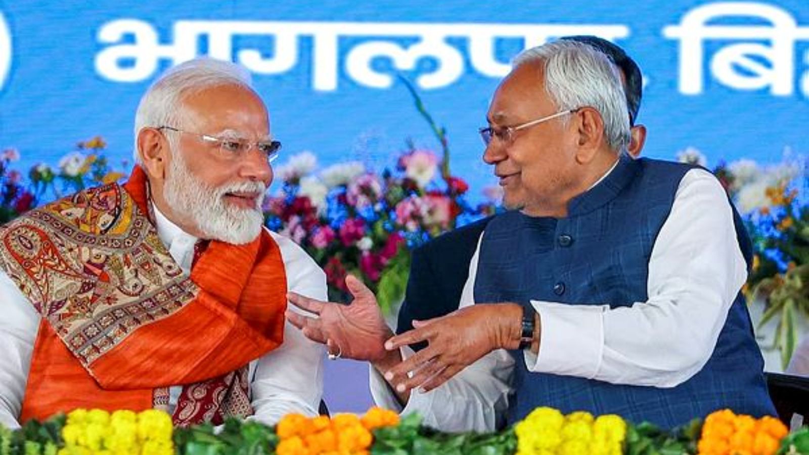 Prime Minister Narendra Modi with Bihar Chief Minister Nitish Kumar during the release of the 19th installment of the PM Kisan Samman Nidhi scheme and launch of various development projects, in Bhagalpur, Bihar, on Monday. (PTI Photo)