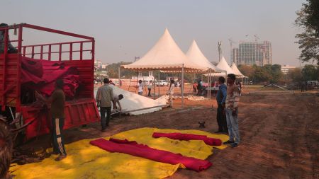 Preparations underway at Ramlila Maidan for oath -taking event of the new Delhi Chief Minister, on Monday. (Express Photo/Amit Mehra)