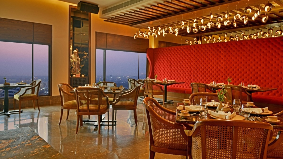 Indulge in authentic Pan-Asian cuisine, a decadent rainbow chocolate cake, and luxurious handcrafted chocolates, all set against a breathtaking ambiance. Enjoy