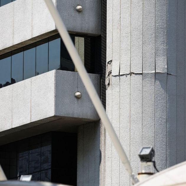 A crack is seen on a building after the strong tremors felt in Myanmar and Bangkok. A high-rise building also collapsed in Bangkok, with multiple casualties feared.