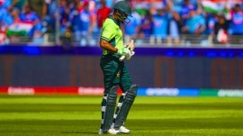 Pakistan's Babar Azam leaves the field after losing his wicket during the ICC Champions Trophy cricket match between India and Pakistan at Dubai International Cricket Stadium, United Arab Emirates, Sunday, Feb. 23, 2025. (AP Photo)
