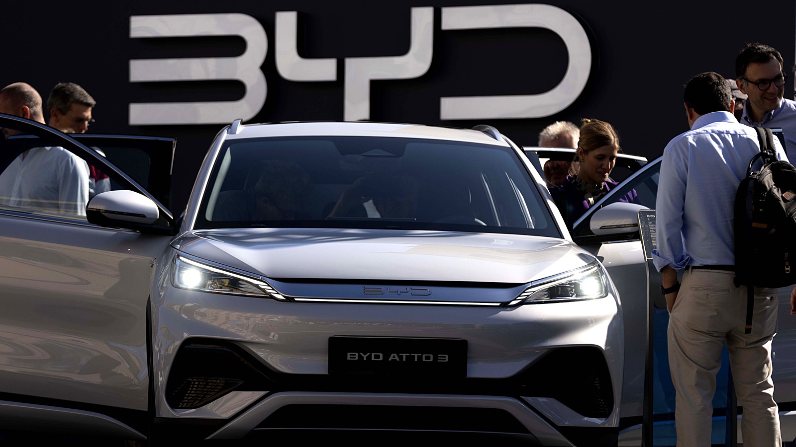 Visitors check the China-made BYD ATTO 3 at the IAA motor show in Munich