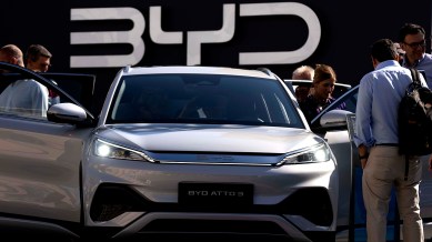 Visitors check the China-made BYD ATTO 3 at the IAA motor show in Munich