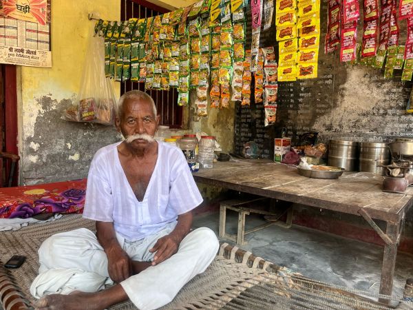 Bhoop Singh, the primary witness in the case, at his shop-cum-house in Dehuli village. He lost eight members of his family that day. Saman Husain
