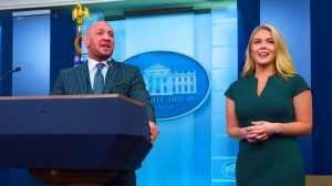 White House press secretary Karoline Leavitt listens as UFC fighter Conor McGregor speaks with reporters in the briefing room of the White House, Monday, March 17, 2025, in Washington. (AP Photo)