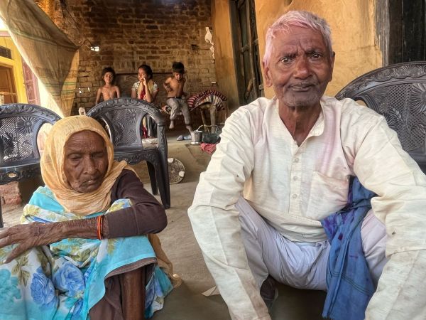 Survivor Chameli Devi with her son at their residence in Dehuli village. Her husband was shot dead by the dacoits on November 18, 1981. Saman Husain