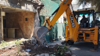 Days after he walked out on bail, SMC razes ‘illegal’ structures built by murder accused