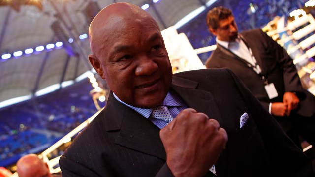 FILE PHOTO: Former heavyweight champion George Foreman gestures before the heavyweight title unification boxing match between Ukrainian IBF and WBO titleholder Vladimir Klitschko against British WBA champion (Reuters)