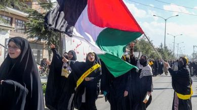 Shia Muslim women take part in a procession to show solidarity with Palestine on International Quds Day, at Magam area in Budgam district, Jammu & Kashmir, pro-Palestine