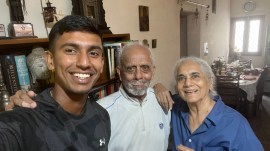 India goalkeeper Suraj Karkera with war veteran Ian Cardozo and his wife Priscilla at their home in New Delhi.