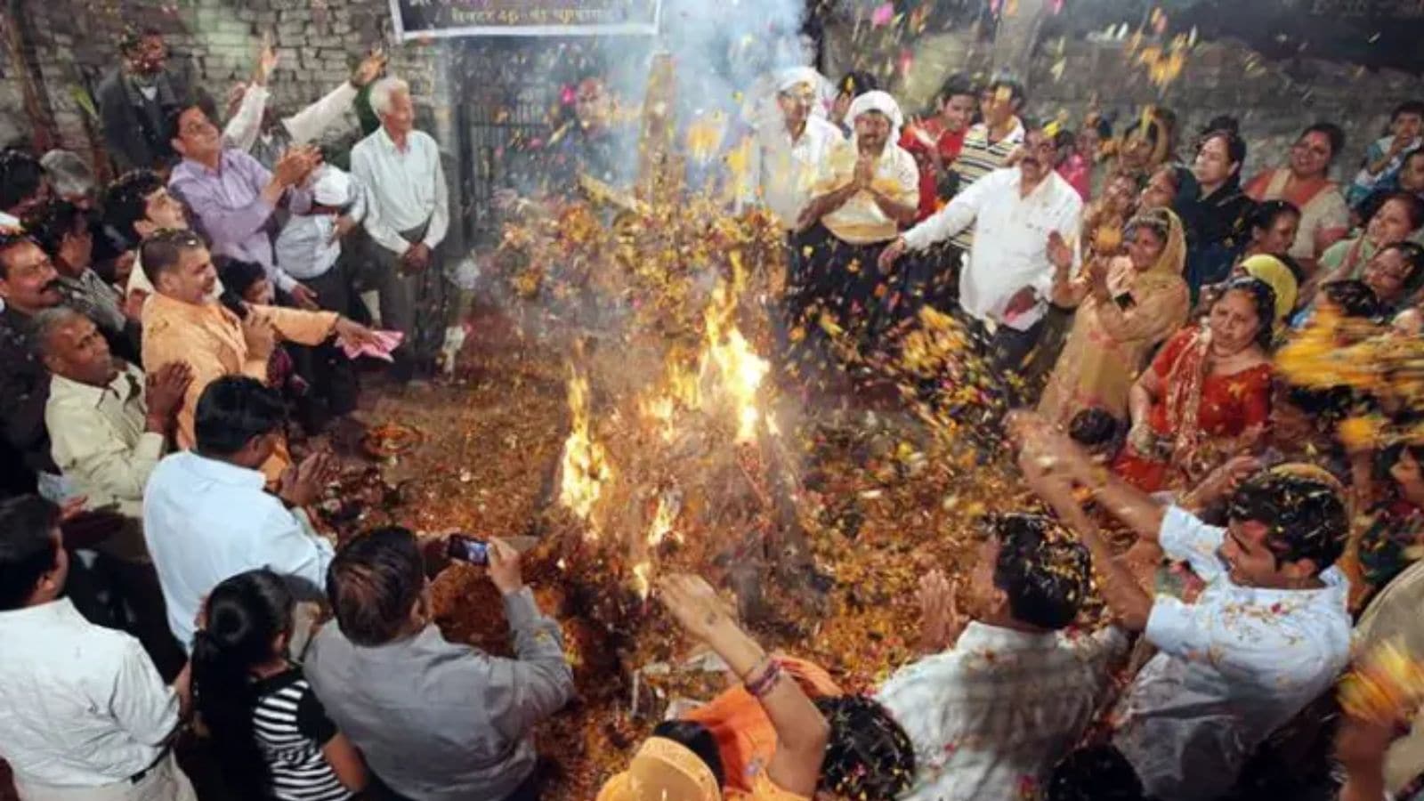 People gather for Holika Dahan (Source Express File Photo by Jasbir Malhi)